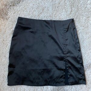Black silk mini skirt, size (S)